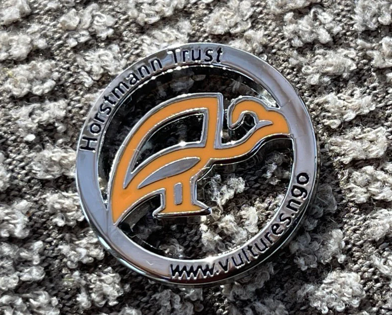 Horstmann Trust Round Pin Badge